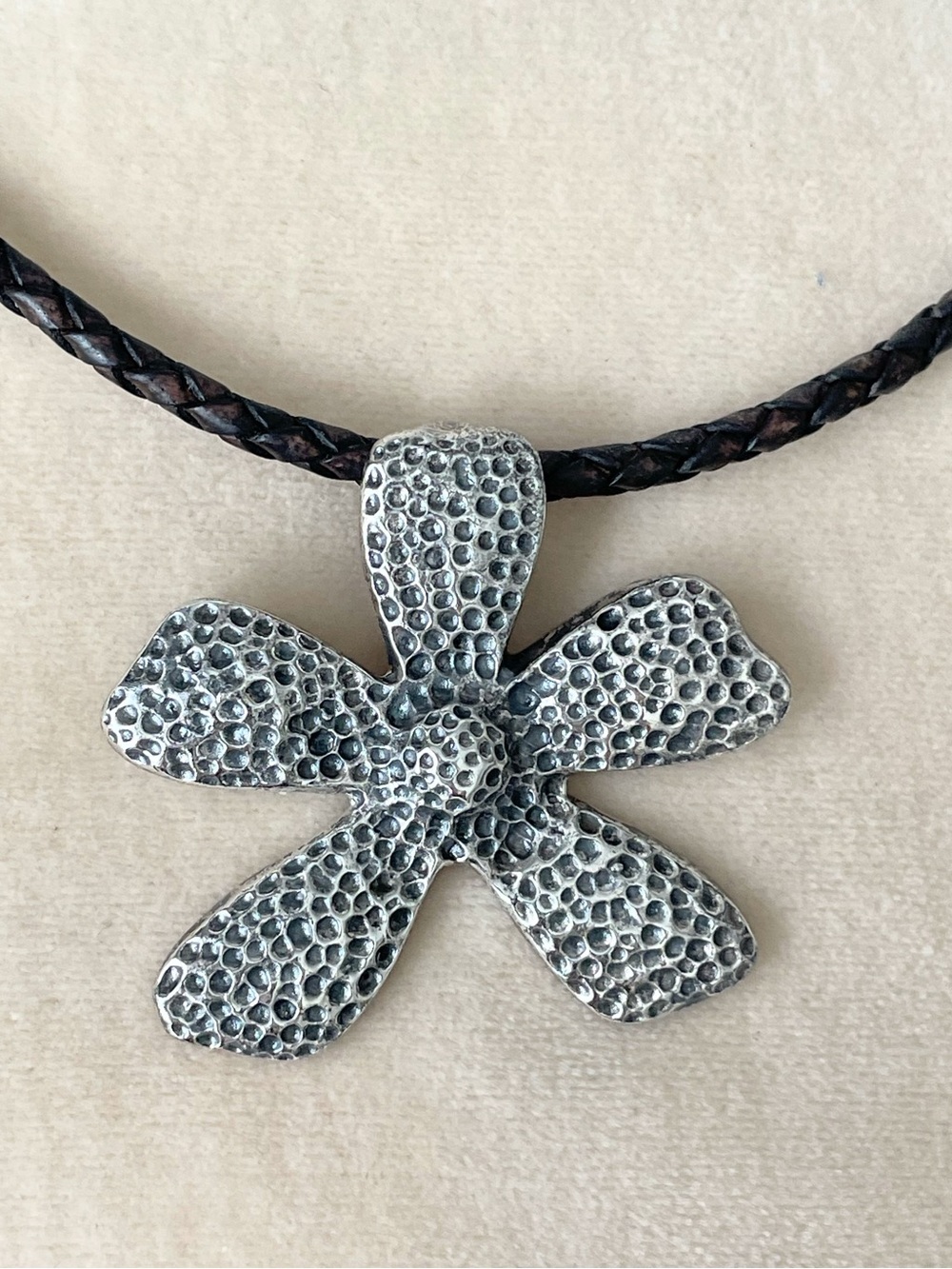 Silpada Sterling Silver Hammered Flower Pendant on Braided Leather Cord